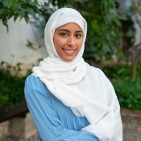 front-view-woman-wearing-halal-outdoors_23-2150701497